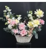 Композиция из французских роз,эустомы и эвкалипта в белой корзине