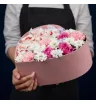 композиция из розовых роз, розовых гвоздик, белых кустовых хризантем, сиреневой альстромерии и конфет Raffaello в коробке в форме сердца